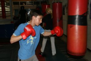 red gloves young boxer